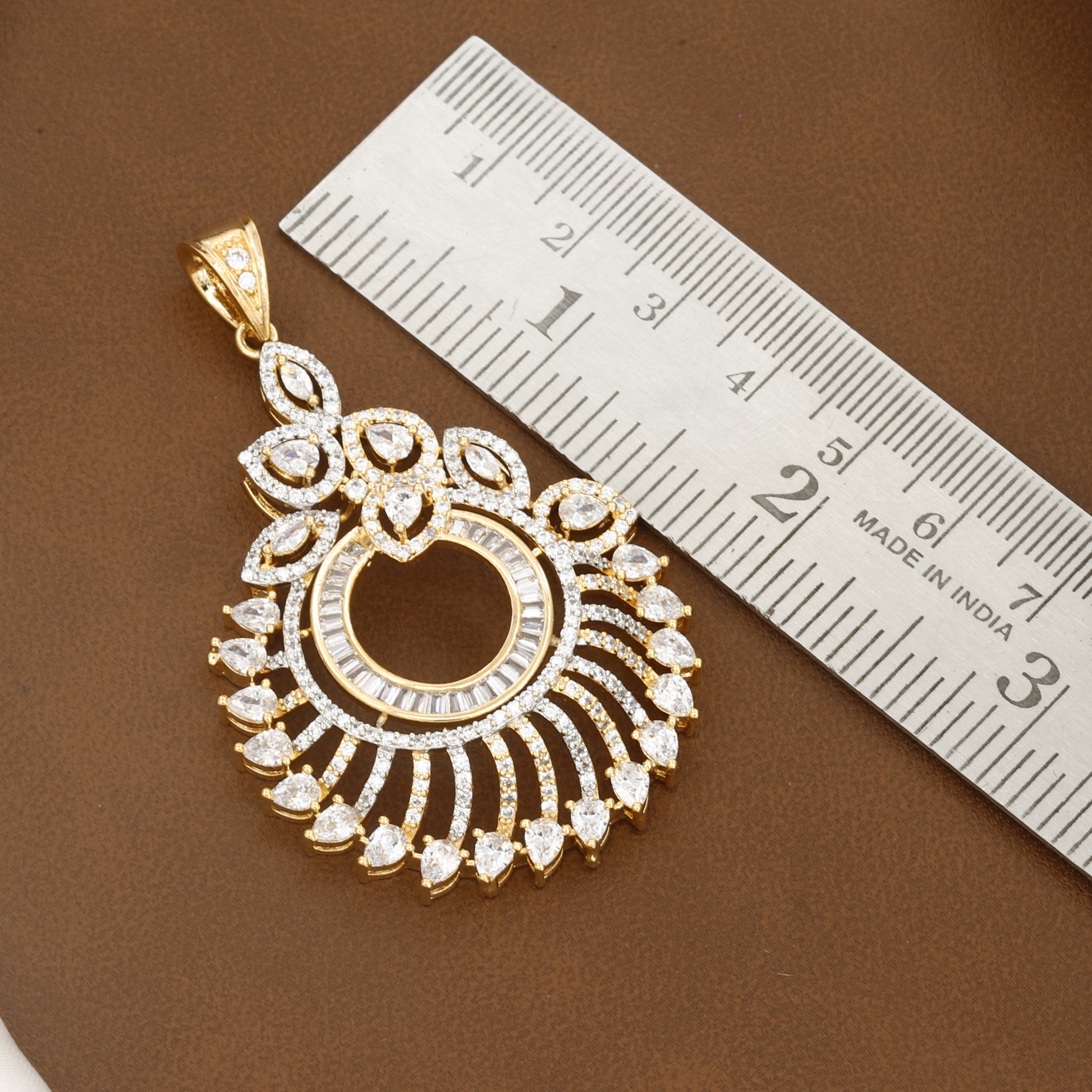 Elegant Gold Sunburst Pendant Set with Matching Earrings And Chain