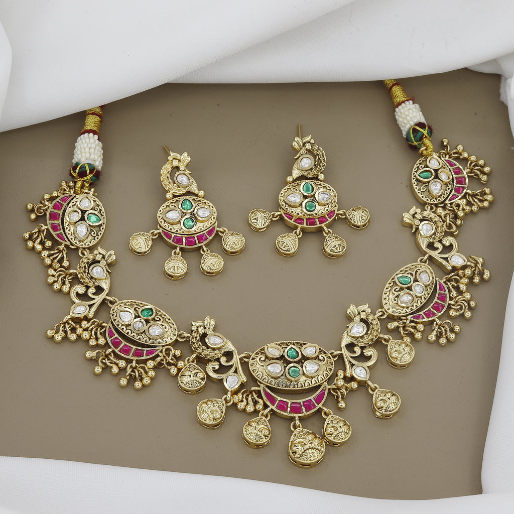 Ornate Antique Gold Necklace Set with Peacock Motifs, Kundan & Gemstones