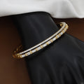 Luxurious Gold Double-Row Bangle with Baguette Crystals & White Inlay