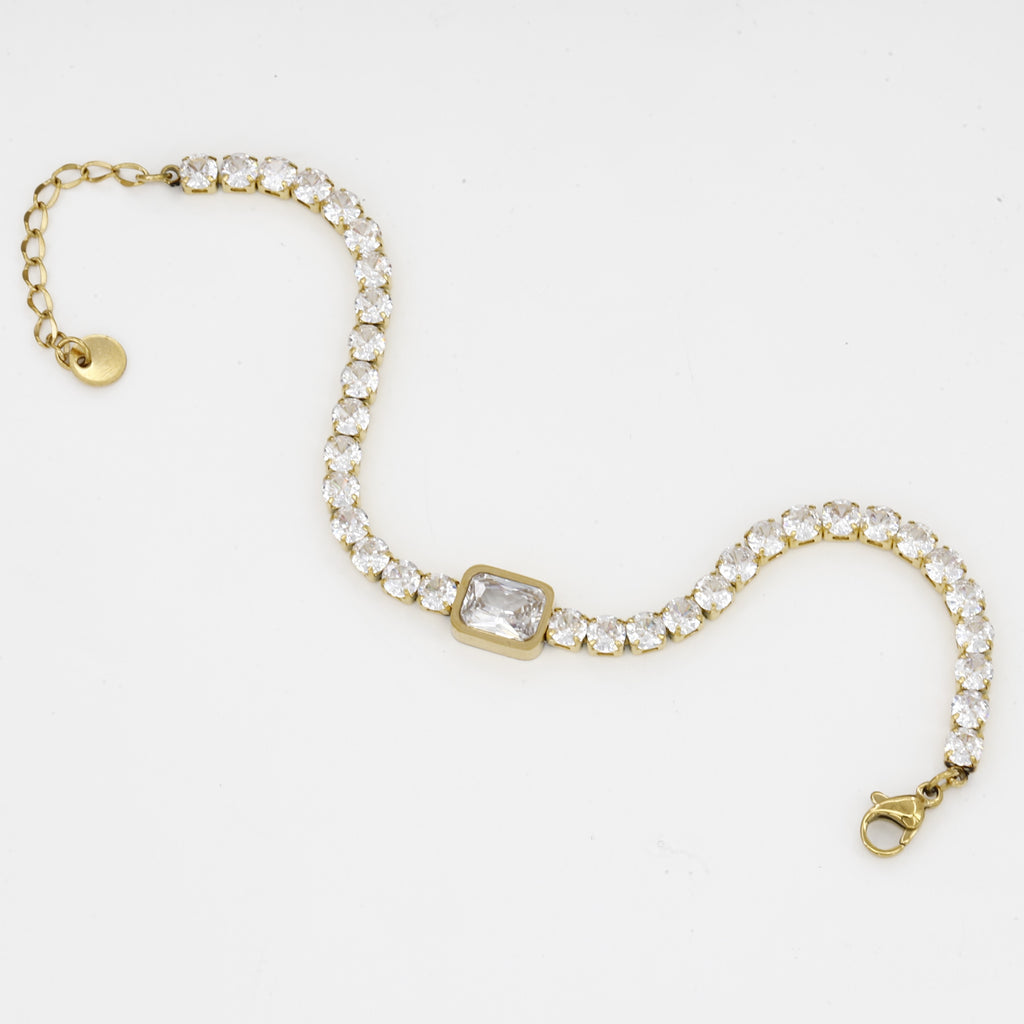 Gold Tennis Bracelet with Emerald Cut Center Stone