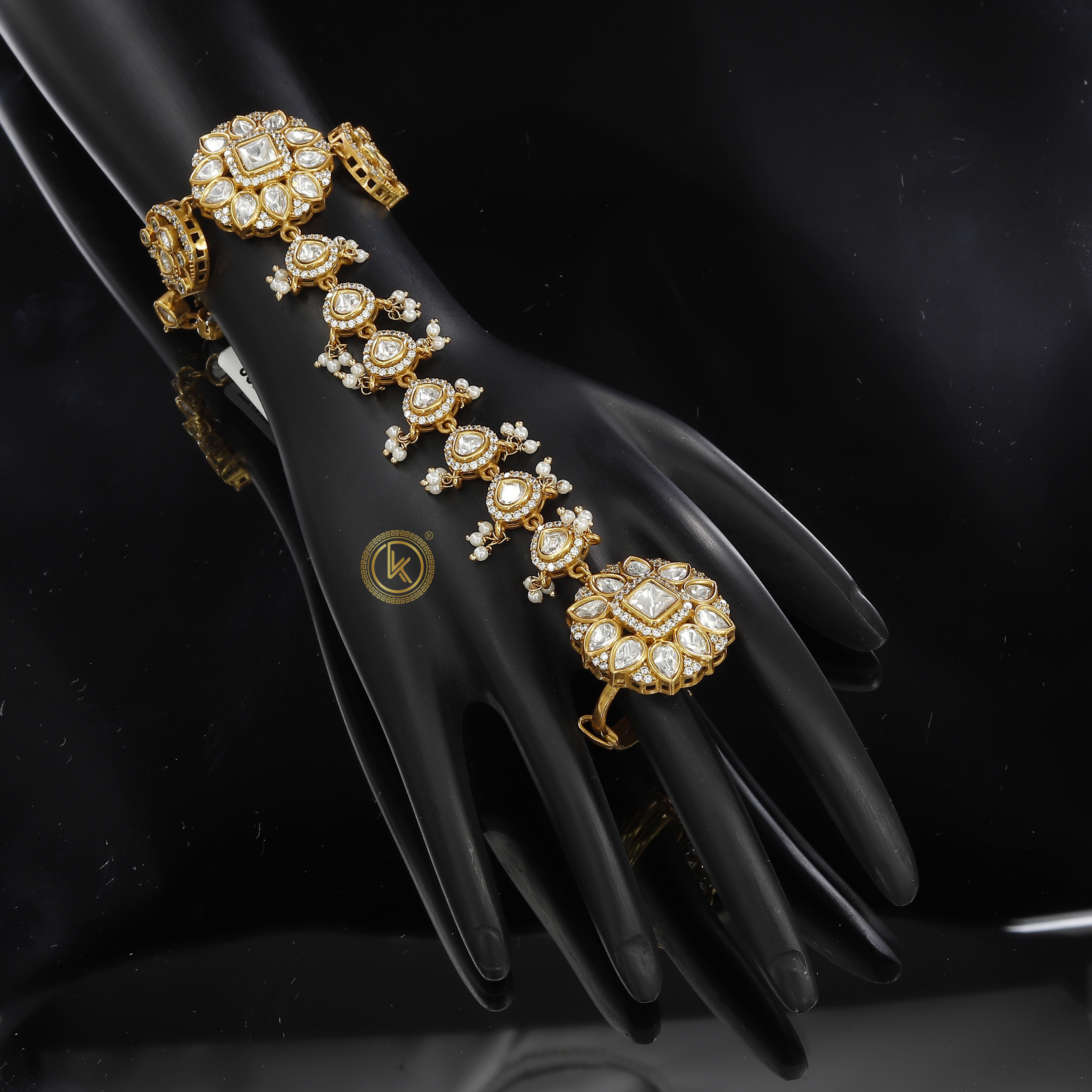 Finely Crafted Gold Hath Bracelet with Kundan Pearls