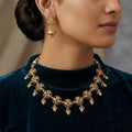 Charming Antique Gold Finish Necklace Set with Floral Filigree & Jhumki Earrings